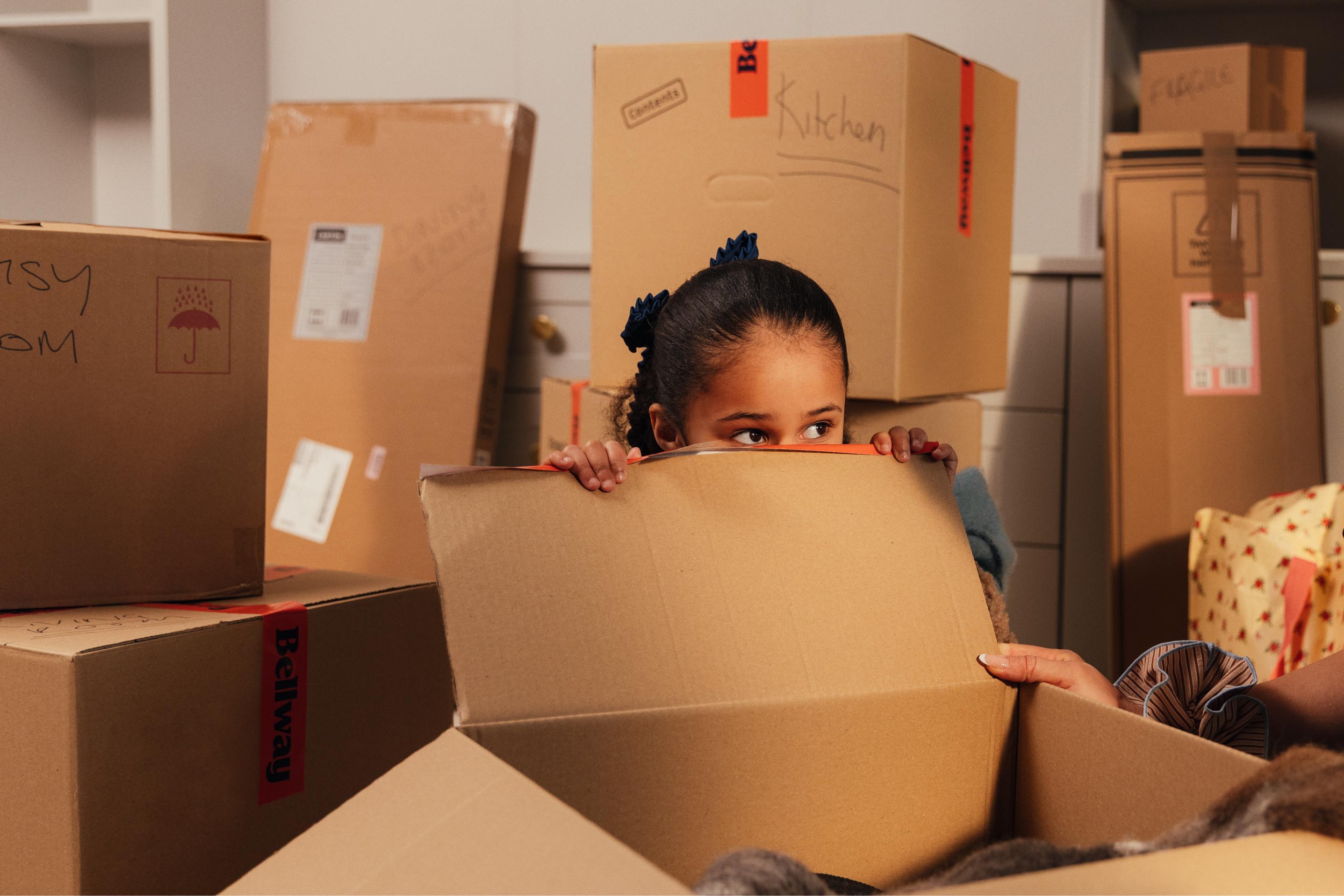 A girl with moving boxes