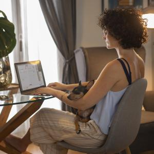 Person working from home with pet dog 1