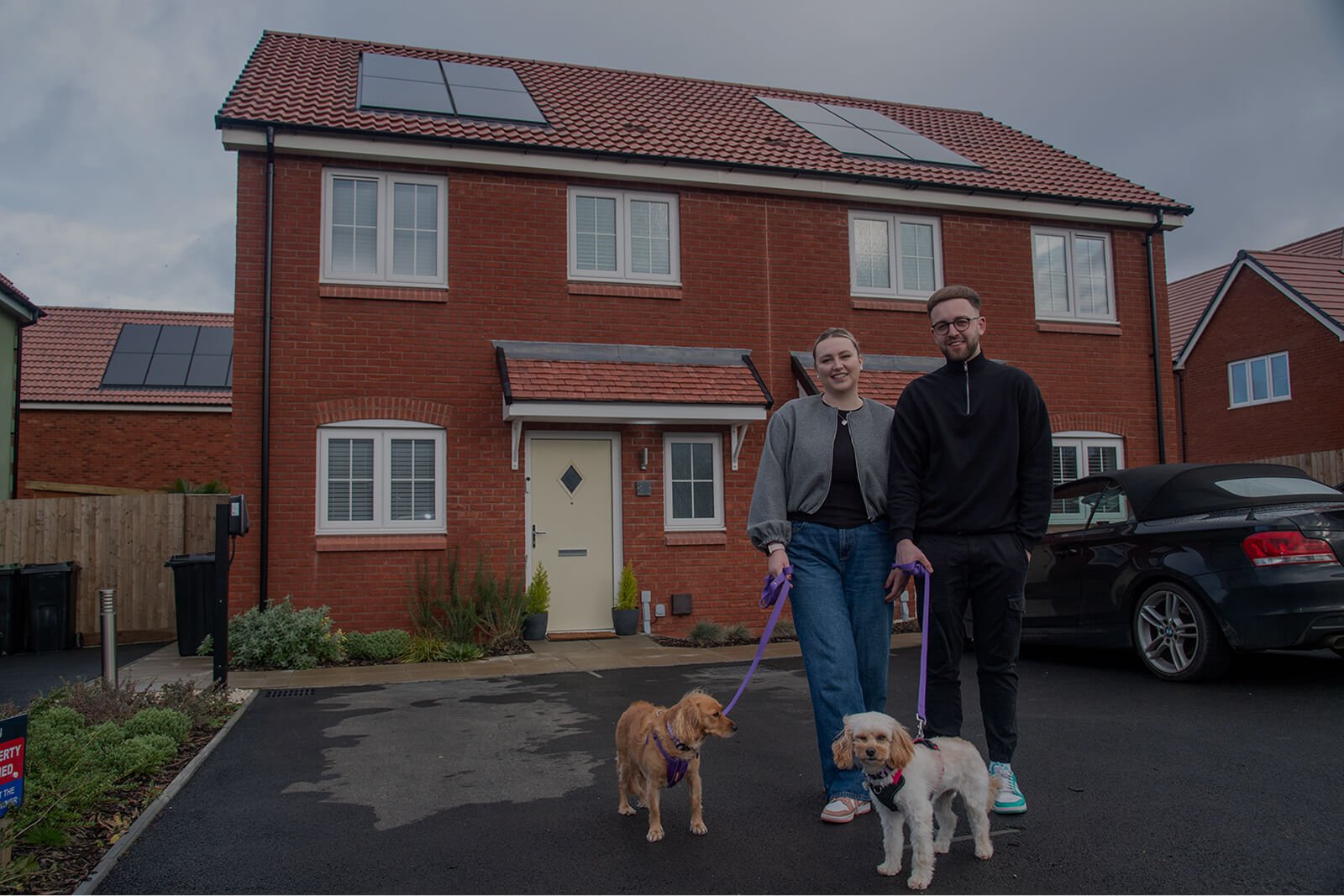 Ryan and Aimee outside home